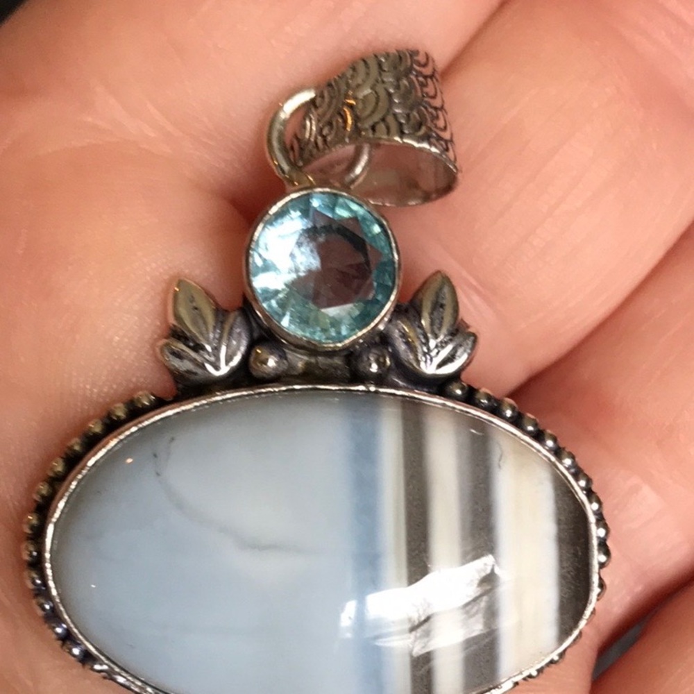Ornate Blue and Silver Necklace with Intricate Design